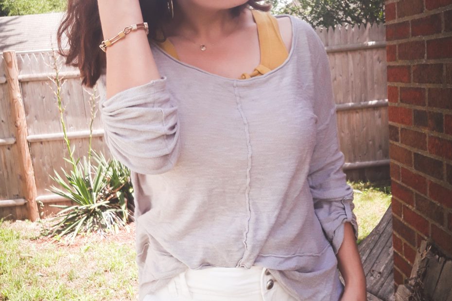 secondhand White pants, yellow knit top, and grey sweater