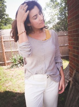secondhand White pants, yellow knit top, and grey sweater