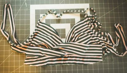 Bikini top with additional fabric under bust